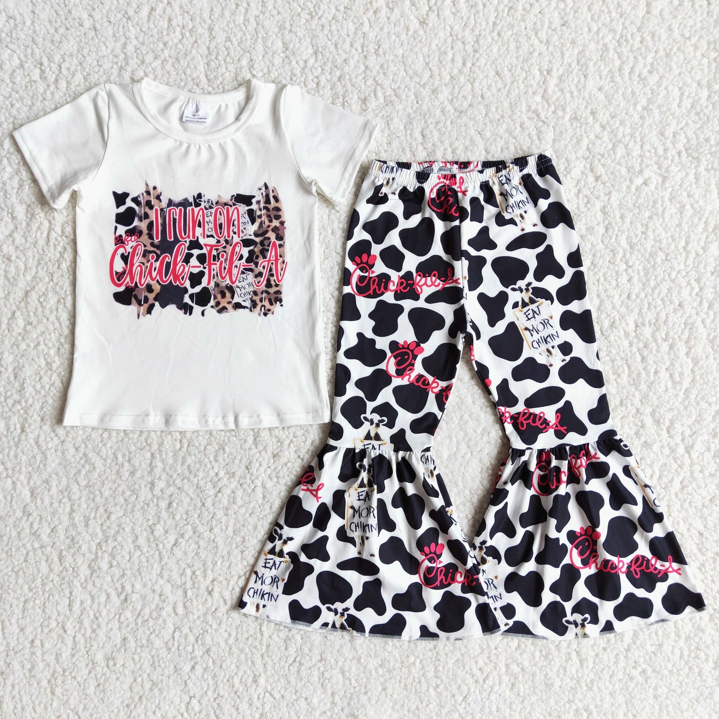 Promotion RTS E7-2 i run chick letters cow print white short sleeve bell bottom pant girl outfit