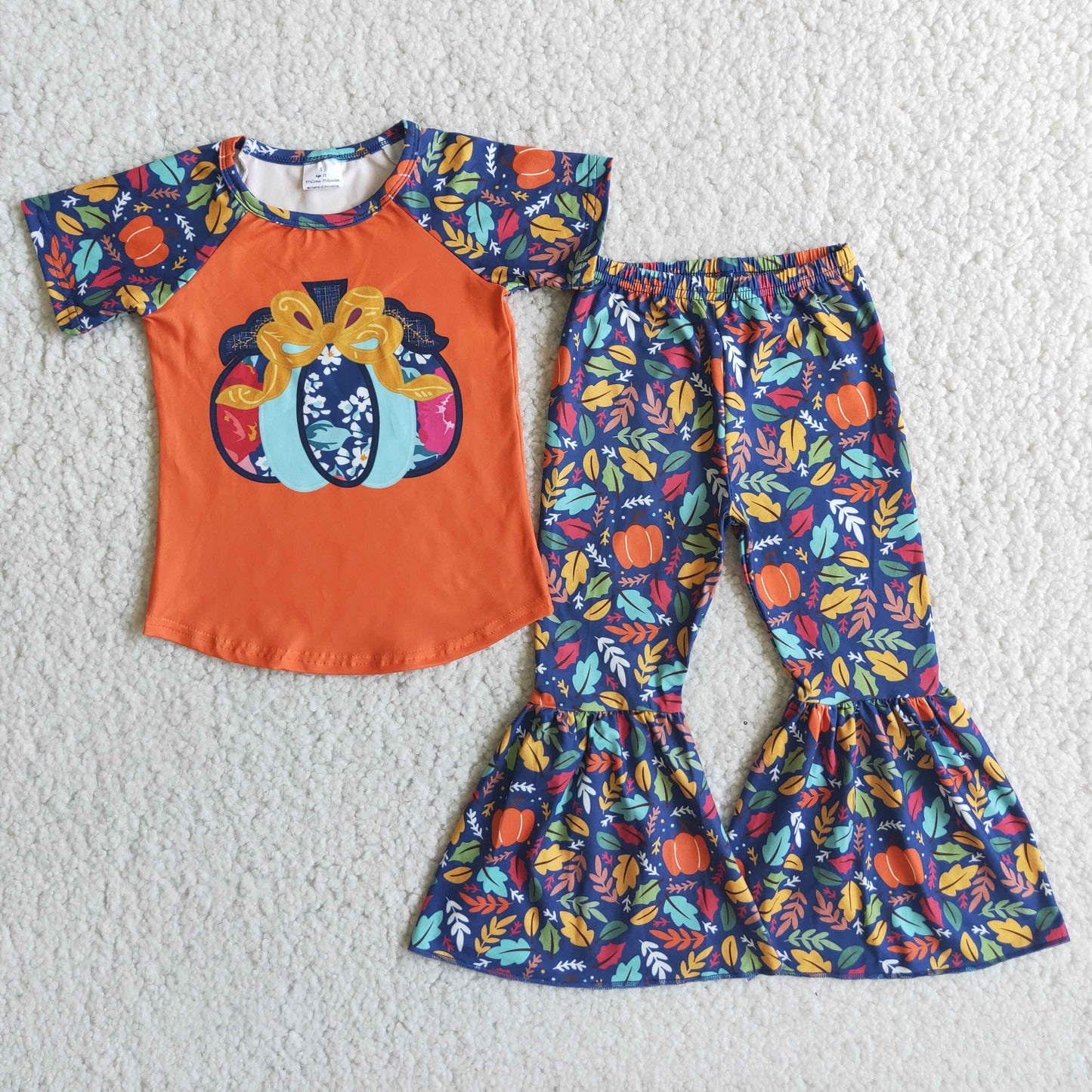 orange raglan pumpkin short sleeve bell bottom pant girl outfit