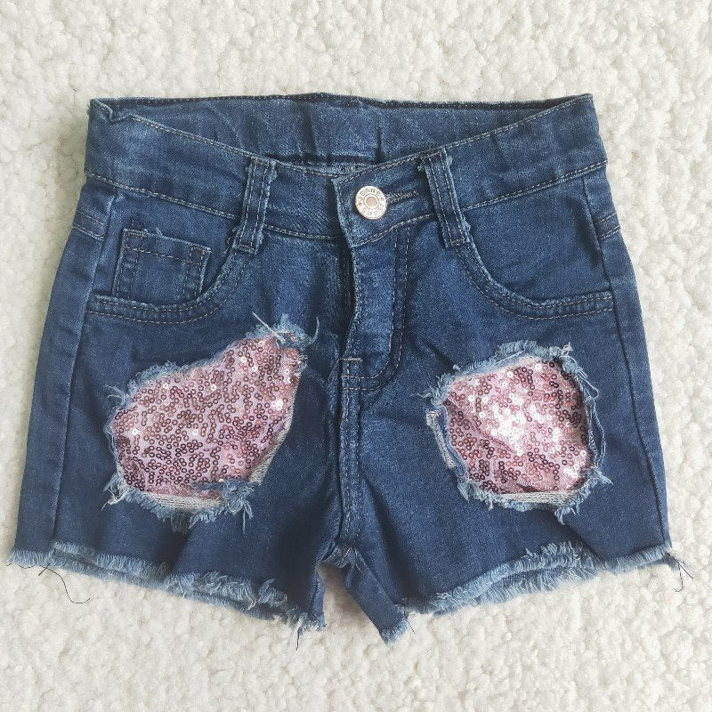 girl pink sequins blue ripped denim shorts