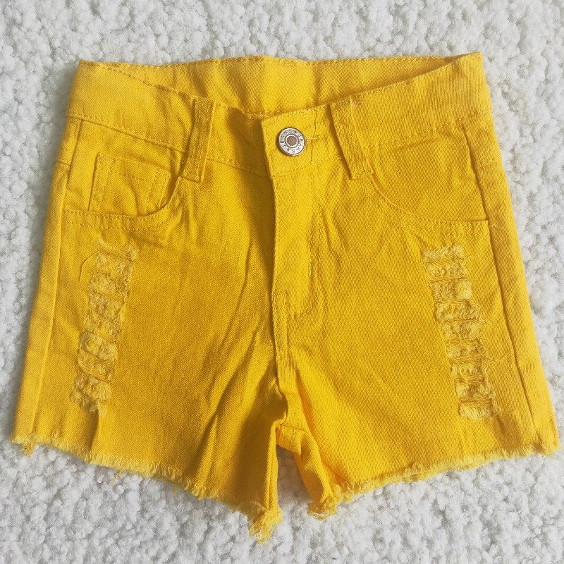 girl button yellow ripped denim shorts