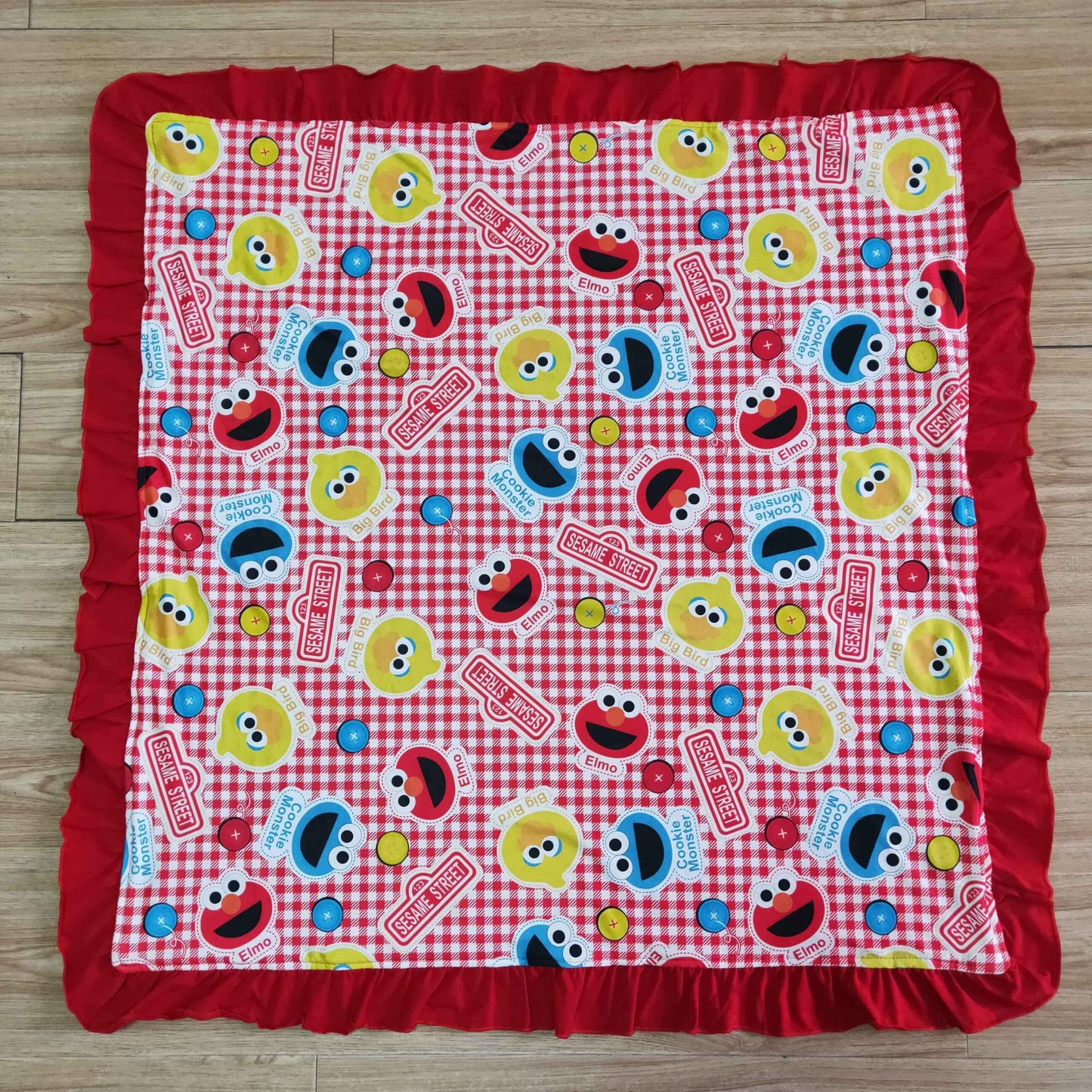 red white plaid yellow blue letters cartoon blanket