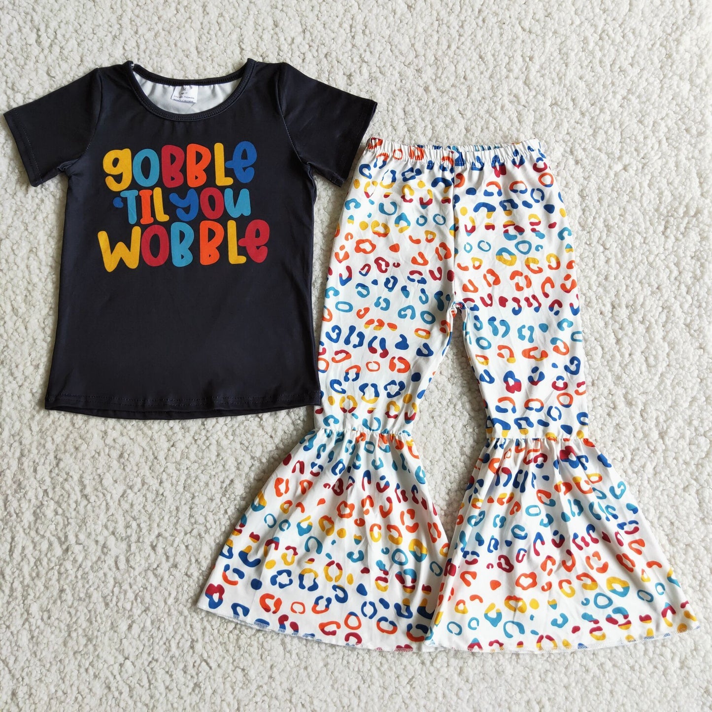 gobble letters black colorful leopard print short sleeve bell bottom pant outfits