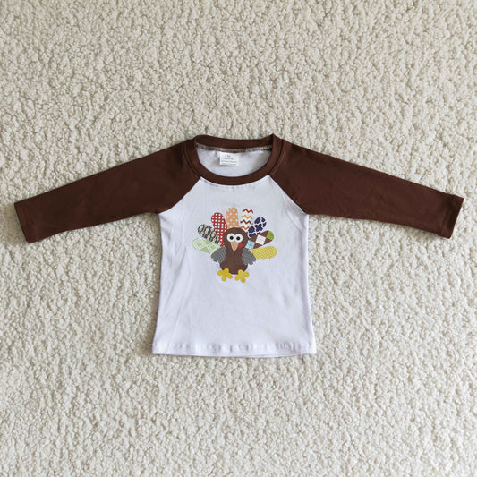 Brown raglan white turkey gel print long sleeve top