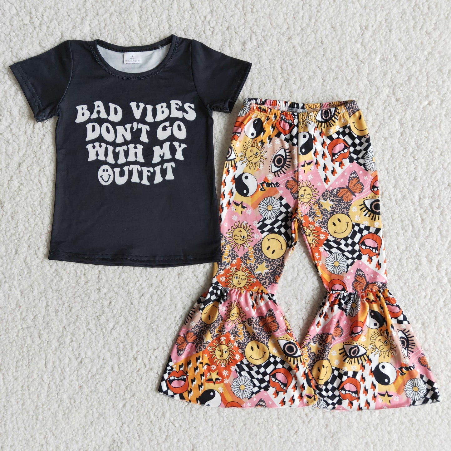 bad vibes letters eyes smile girl short sleeve bell bottom outfit